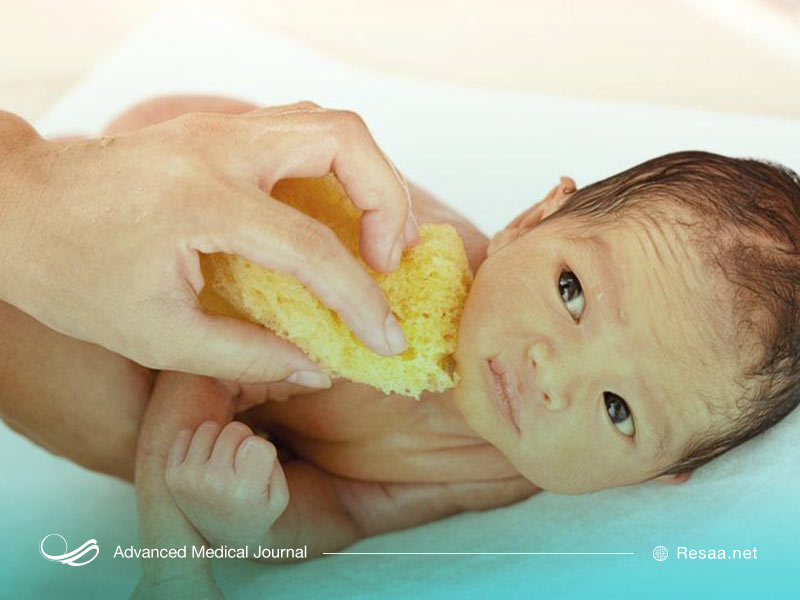 اسفنج خیس و پایین اوردن تب