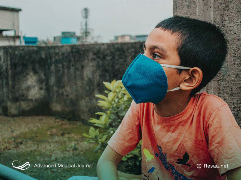 تصویر کودکی با ماسک بهداشتی